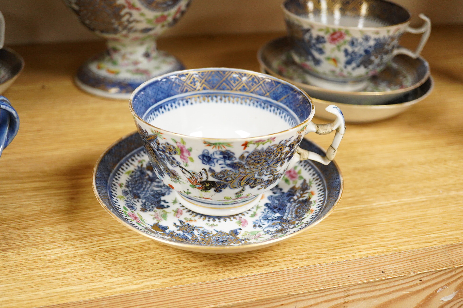 An early 19th century Chinese porcelain part tea set and matching sauce boat - teapot 25cm high